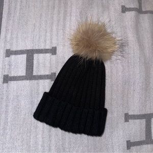 NWOT black with tan faux fur pom knit hat